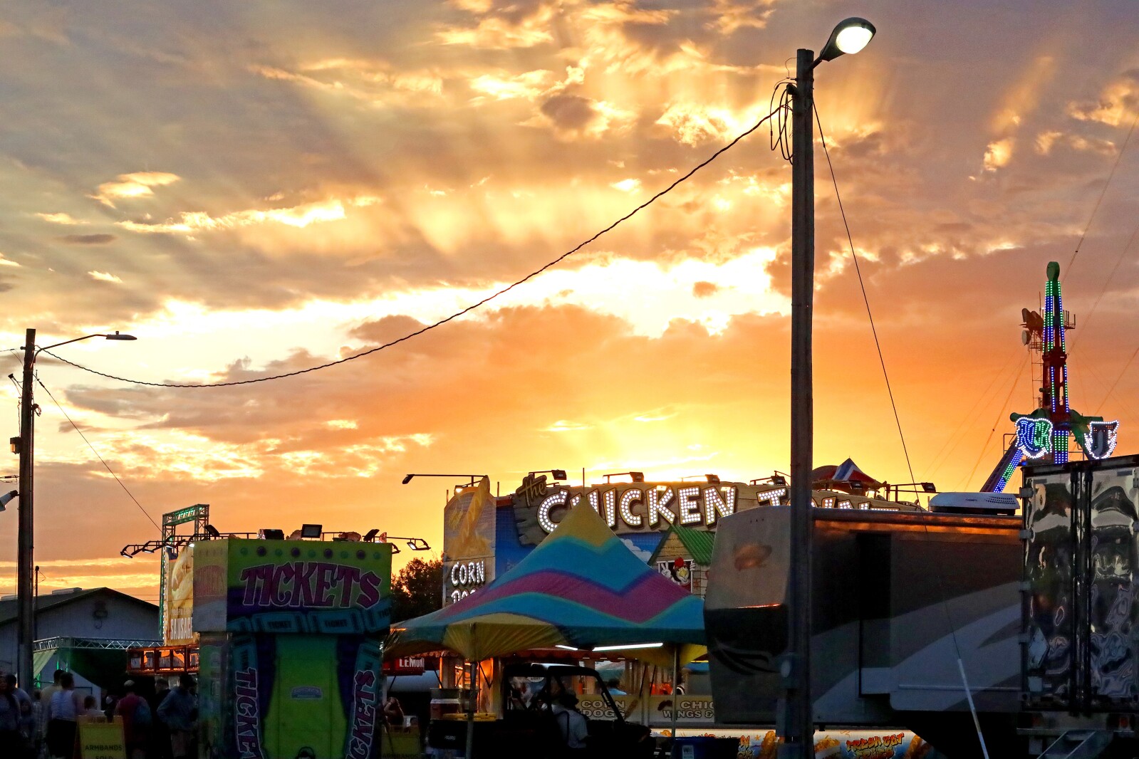 People enjoy the Crow Wing County Fair midway.