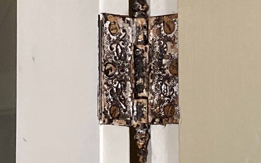 a hinge on a door