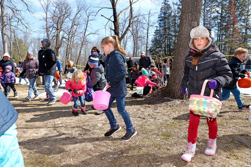 Families enjoy the Annual Lake Shore Easter Egg Hunt Saturday, April 17, 2022, at Fritz Loven Park.