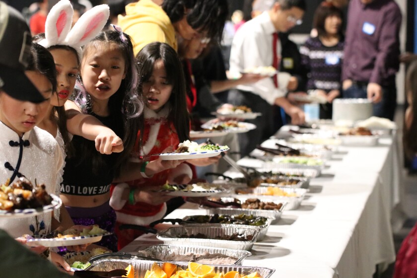 Attendees of the United Chinese Americans of Fargo/Moorhead banquet celebration welcoming in the Year of the Rabbit at TAK Music Venue in Dilworth, Minn. on Sunday Jan. 22, 2023.jpg