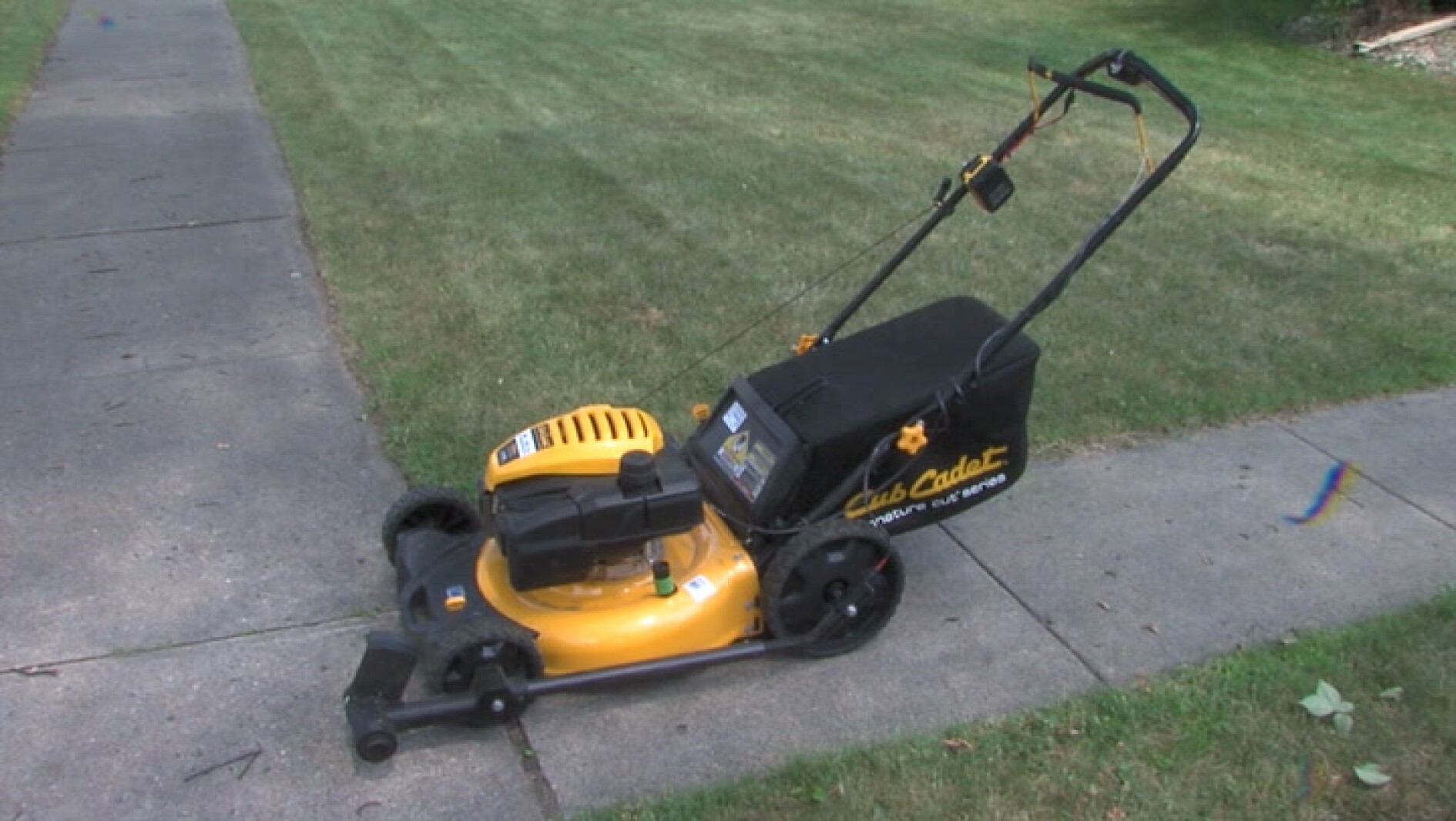 Moorhead inventor creates lawn mower trimmer attachment
