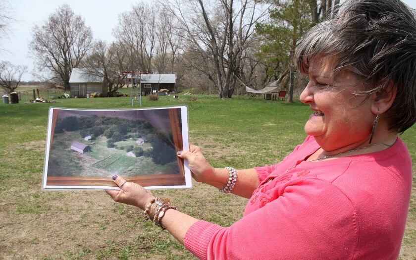 brown barn beacon michele stadler holding photos 051122.jpg