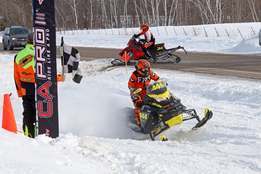 Snowmobilers race