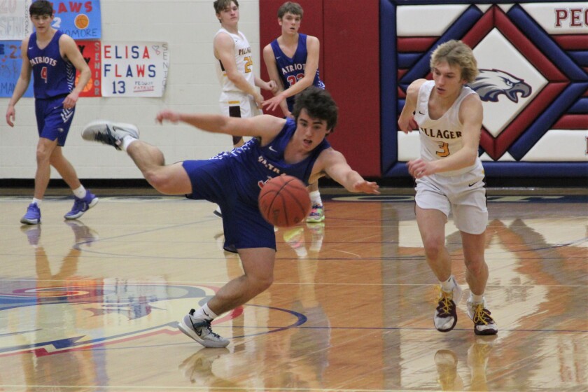 Pequot Lakes Patriot Boys take the ball to the hoop