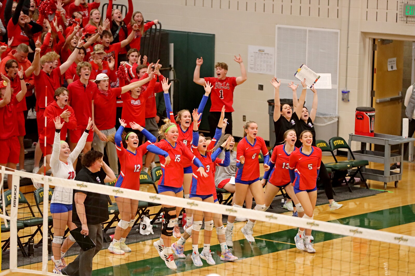 Pequot Lakes celebrates winning a point against St. Cloud Cathedral on Saturday, Nov. 5, 2022, during the Section 6-2A Final at Sauk Rapids.