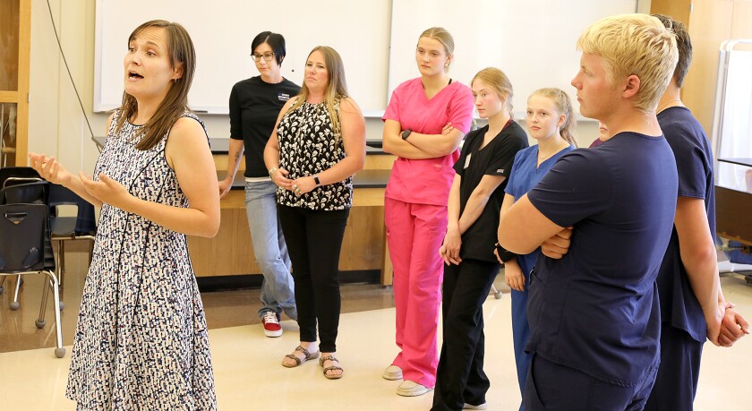 Jenny Forsythe, left, talks about the students in the first ever CNA class at Northwestern High School