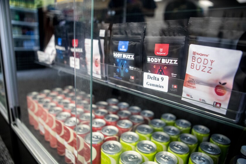 Delta9-THC edible gummies sit behind a glass case at D & D Smoke on Tuesday, July 19, 2022.