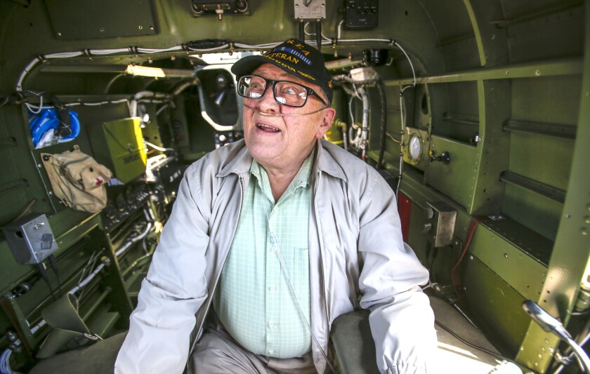 Korean War veteran Earl Rogers, 82, of Duluth, gets a look at a B-25 bomber for the first time since 1956 Friday at Duluth International Airport. Rogers served in the Air Force as an air traffic controller.Tyler Schank / tschank@duluthnews.com