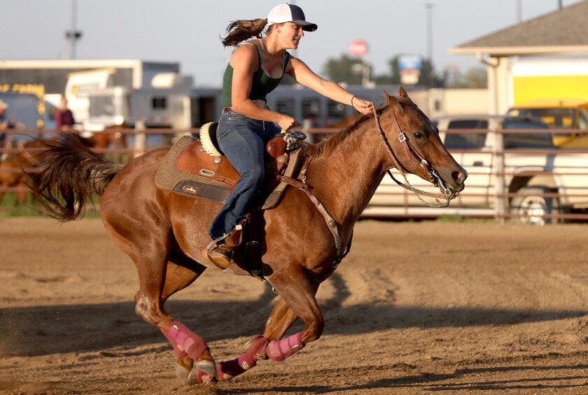 Mn Barrel Racing Horses, riders compete in barrel racing - The Globe | News, weather ...