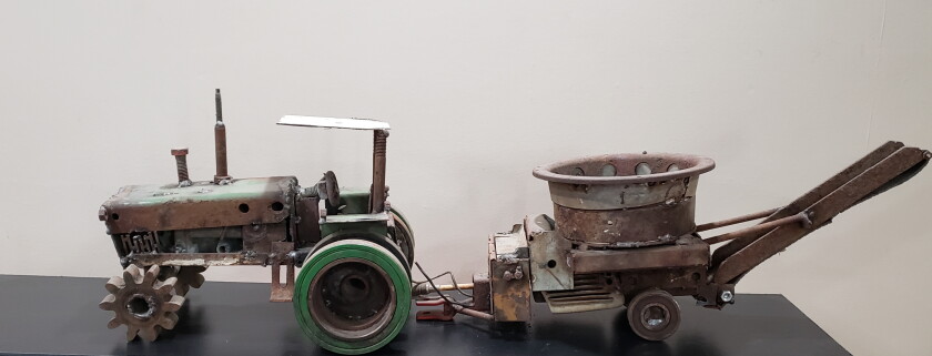 This work by Jason Amberg shows the variety of scrap pieces that go into the works. The works were displayed one year at the Renville County Fair, and Jason and his brother and dad enjoyed listening to those viewing the works and identifying the machinery from which the parts came.