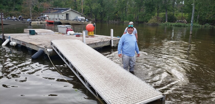 GM in water by dock.jpg