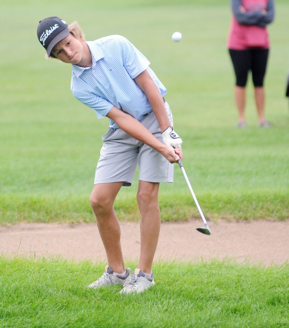 Henry Buttweiler chips from just in front of the 10th green at t