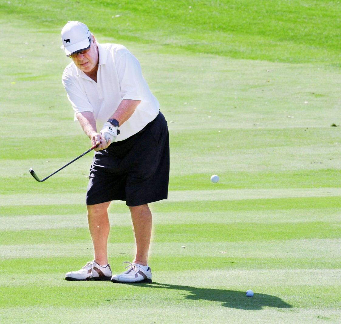 Jerry Gruidl attempts to chip the ball close to the No. 4 pin on
