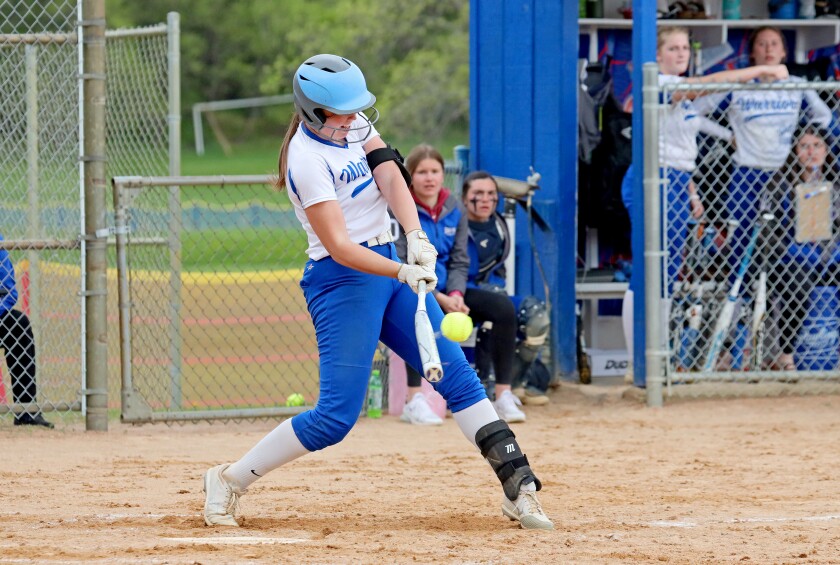 Brainerd's Olivia Tautges hits a home run against Forest Lake.