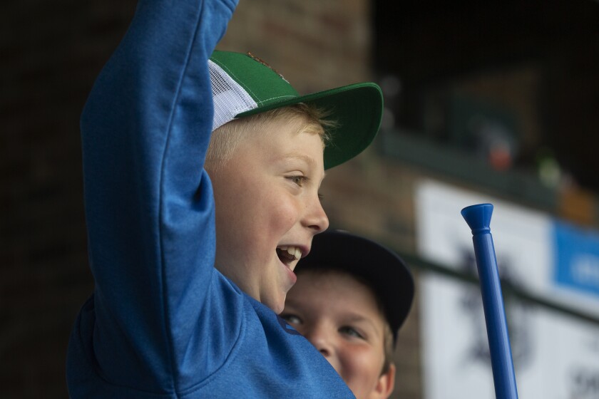 T.J. Wojtysiak cheers for the Duluth Huskies as they play the St. Cloud Rox during Education Day on Monday at Wade Stadium in Duluth. Ellen Schmidt / eschmidt@duluthnews.com