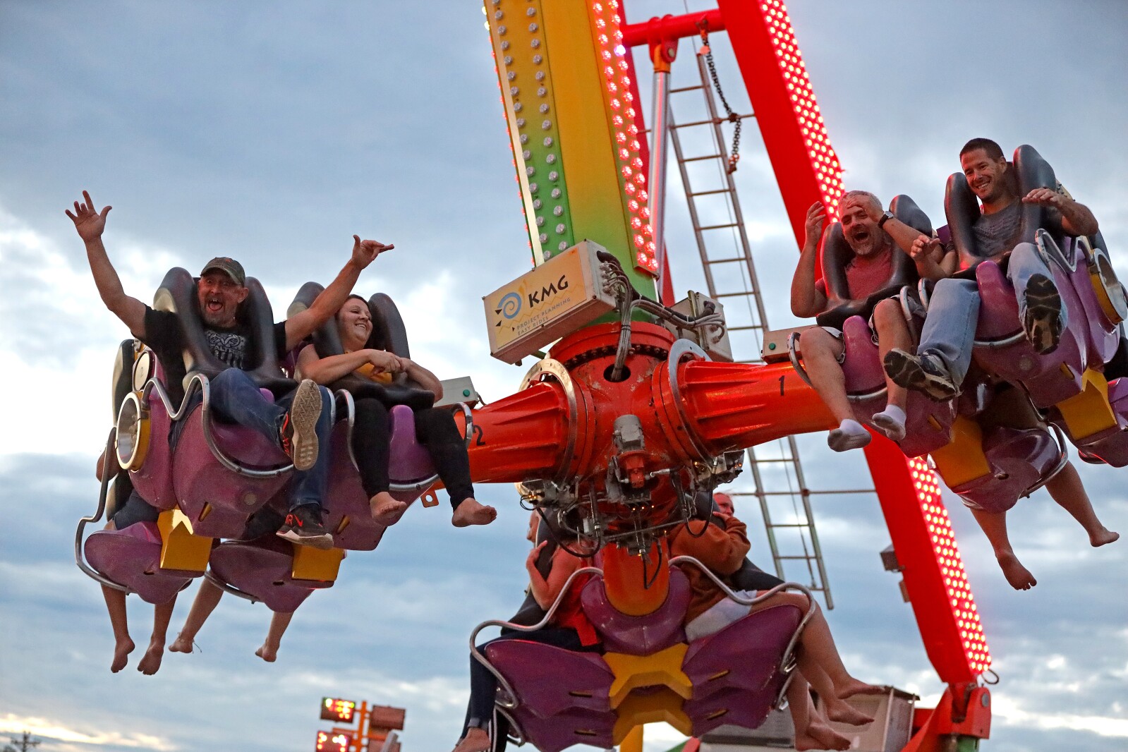 People enjoy the Crow Wing County Fair midway.