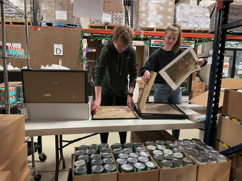 NDSU students frame art at food pantry.png