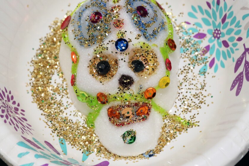Sugar skulls decorated for Dia de los Muertos, or Day of the Dead, during the Second Saturday Arty Party at the Crossing Arts Alliance. Brainerd Dispatch - Gallery and Video