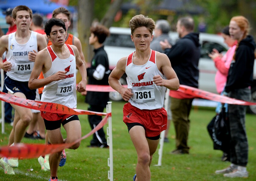 Willmar sophomore Eli Heinen, 7361, and junior Brandon Zepeda, 7375, keep pace with each other during the Willmar Invitational on Saturday, Oct. 1, 2022 at Eagle Creek Golf Club in Willmar.
