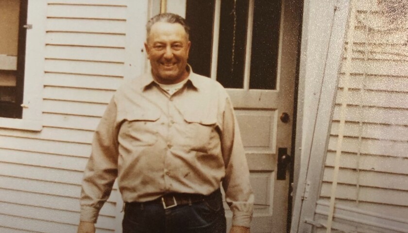 James H. Symington in front of his 100-year-old house in Neche, North Dakota, which was torn down after his death. .jpg