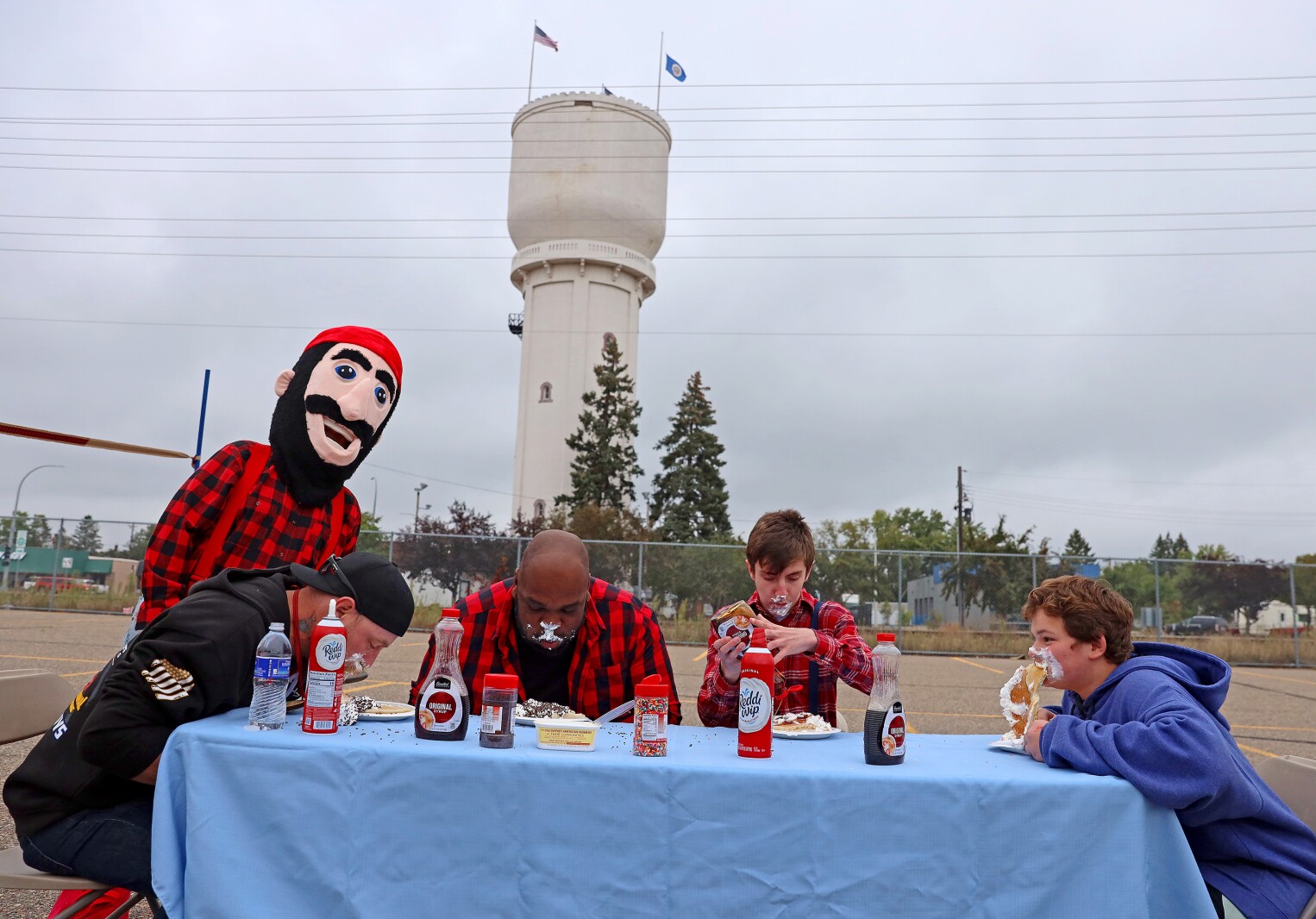 People gather downtown Saturday, Sept. 24, 2022, during the second annual Paul Bunyan Flapjack Festival in Brainerd.