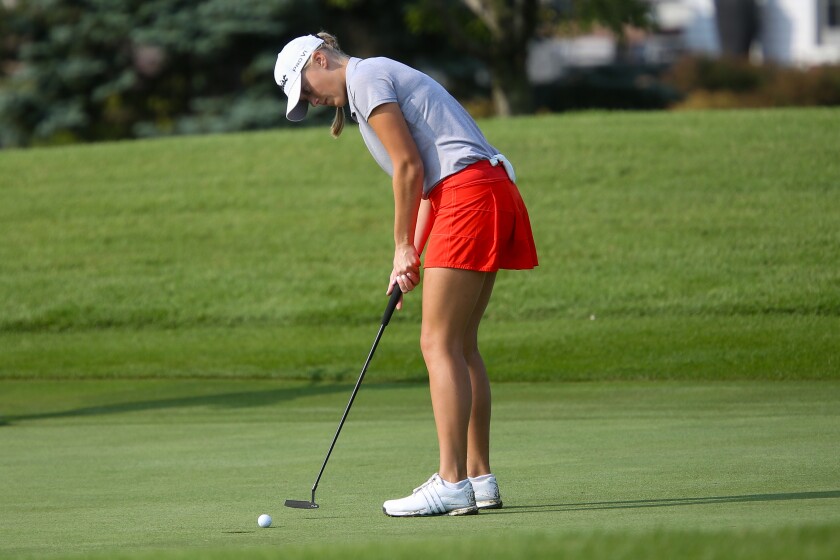 Grand Forks Red River golfer Ella Speidel makes a putt at the Girls Golf Invitational Tournament on Tuesday, Sept. 9, 2025, at Rose Creek Golf Course in south Fargo.