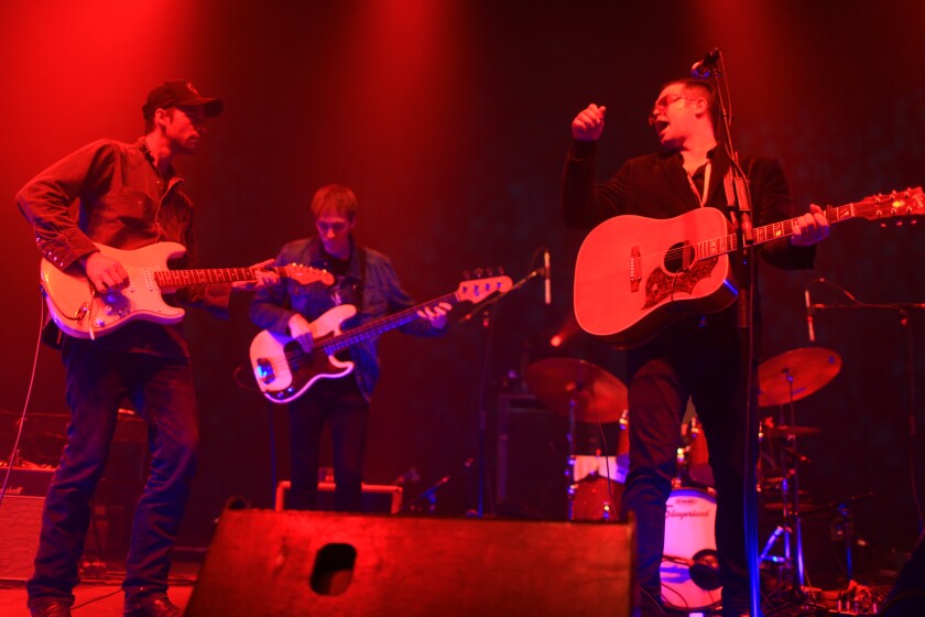 Eric Pollard (left) was joined by Erik Koskinen and Steve Garrington during Actual Wolf's set at the 2014 Homegrown Music Festival. 2014 file/ News Tribune