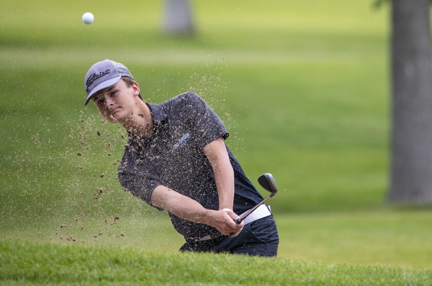 Gannon Walsh of BBE hits his ball out of a sand trap while competing in the state Class A golf tournament at Pebble Creek Golf Course on Wednesday, June 15, 2022.