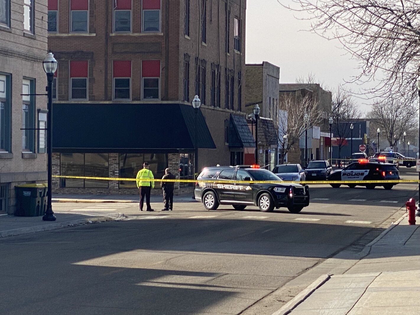 Communication Rack Grounding Man slashing at Willmar police officer on ground when officer fired ...