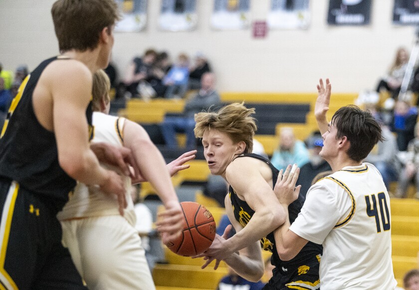 Junior Paul Meier of New London-Spicer works his way through the defense of Howard Lake-Waverly-Winsted Friday, Feb. 4, 2022 in New London.