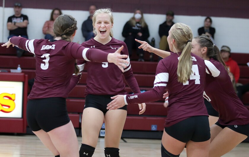 Solon Springs’ Jaelyn Gehl (9) celebrates a kill with her teammates