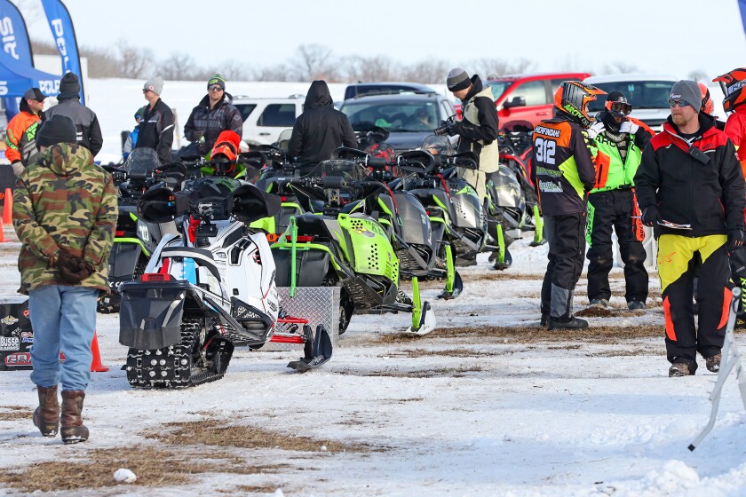 Snowmobilers race
