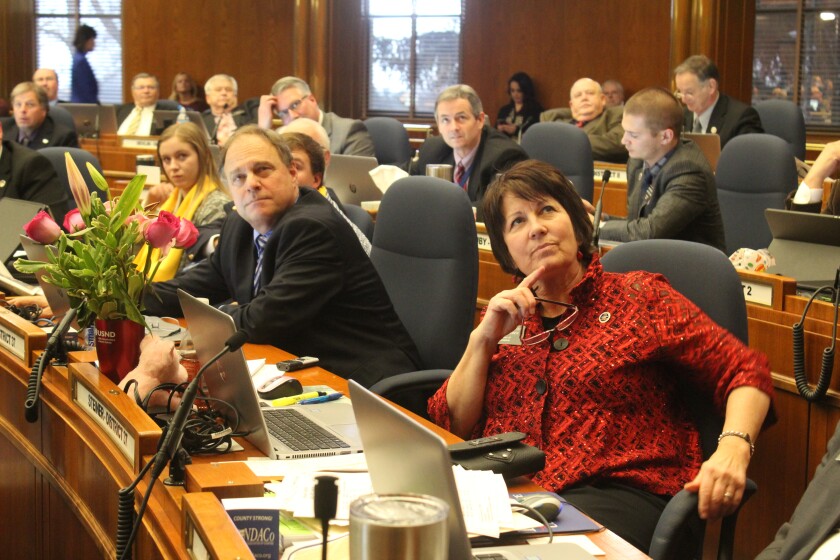 Reps. Mike Lefor and Vicky Steiner, R-District 37, watched the votes come in on the House floor Monday. Photo by Ellie Potter/The Dickinson Press