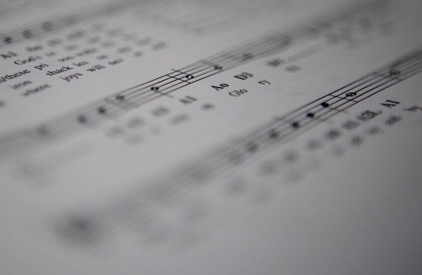 Sheet music sits on a table at Hope Lutheran Church during the free fiddle workshop on Sunday, April 3, 2022, in Sunburg.