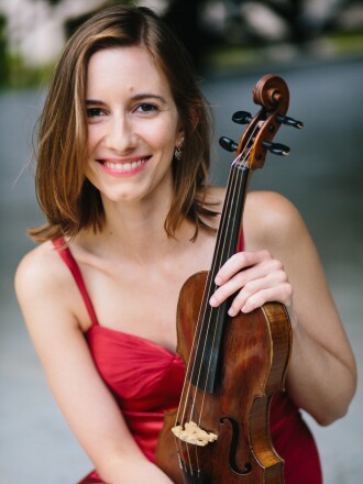 Chloe Fedor holding a violin
