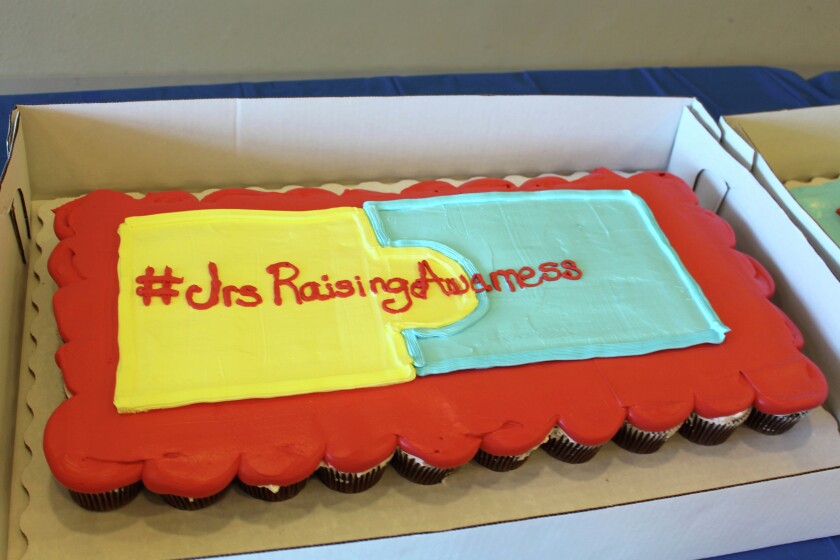 Students at Prairie Rose Elementary had the opportunity to learn more about autism this week through #JrsRaisingAwareness. Students in Jrs' class were given yellow shirts for the cause and the whole school got the chance to have a cupcake. (Sydney Mook / The Dickinson Press)