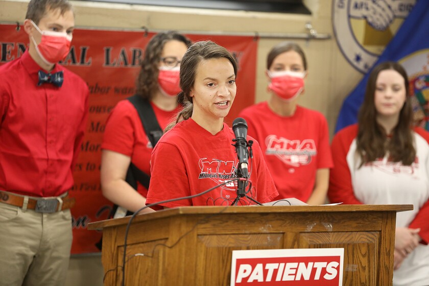 Keandra Schmacher, RN at Essentia, speaks about staffing concerns at a press conference