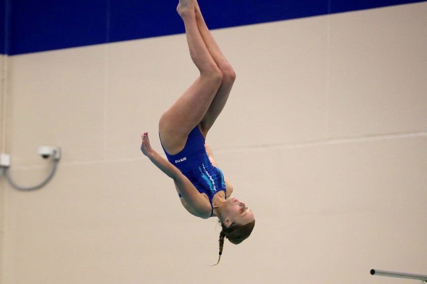 Brainerd's Evi Helsene dives during the Section 8-2A Girls Swimming and Diving finals Saturday, Nov. 12, 2022, at Brainerd High School.
