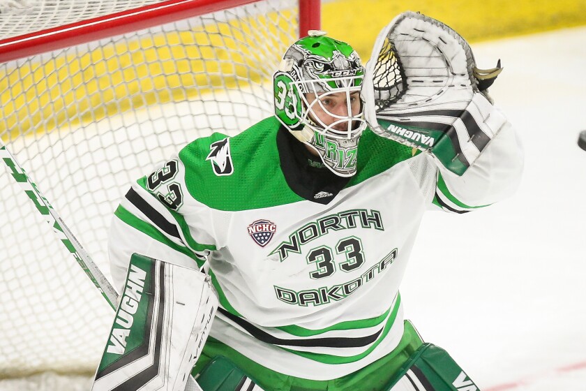 UND men's hockey goalies explain artwork on helmets - Grand Forks Herald