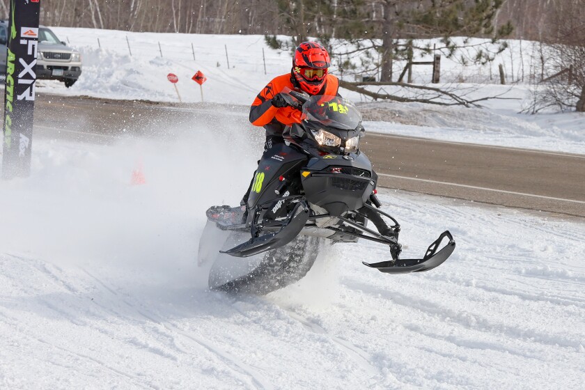 Snowmobilers race