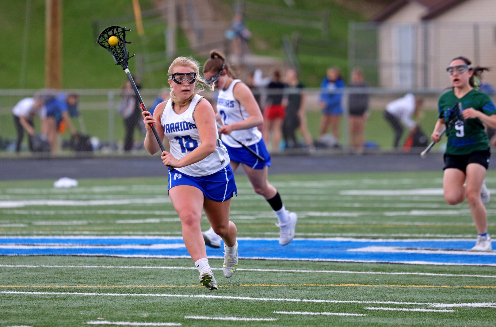 Brainerd's Breya Sawyer runs with the ball against Sartell/Sauk Rapids.