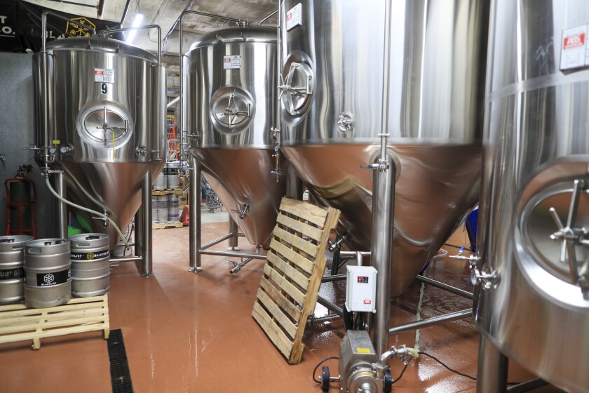 Blacklist Brewing celebrates new location with ribbon cutting