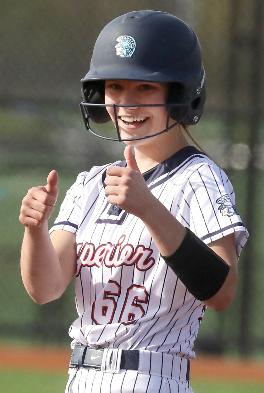 Superior’s Gabbi Saari (66) gives a double thumbs up to her dugout
