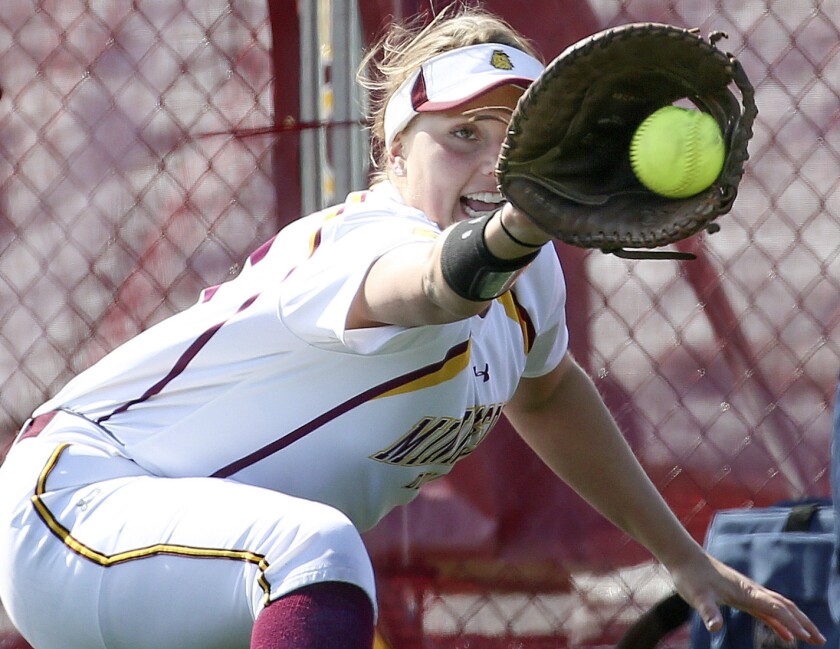 Steve Kuchera / skuchera@duluthnews.comMinnesota Duluth’s Jordyn Thomas of Hermantown catches a throw to first base during a doubleheader against Minnesota-Crookston on April 11.