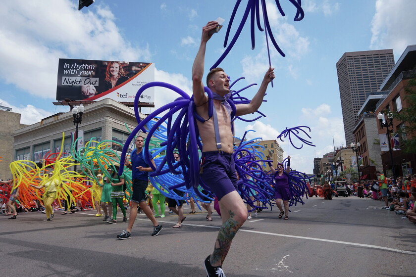 Ashley Rukes Minneapolis streets flood with partiers for Pride - West Central ...