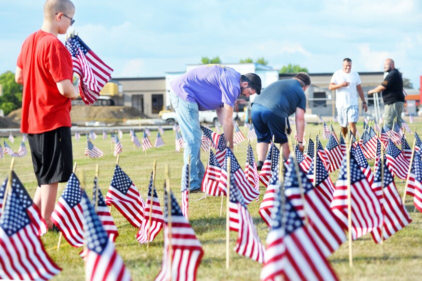Setting up flags for 9/11 ceremony