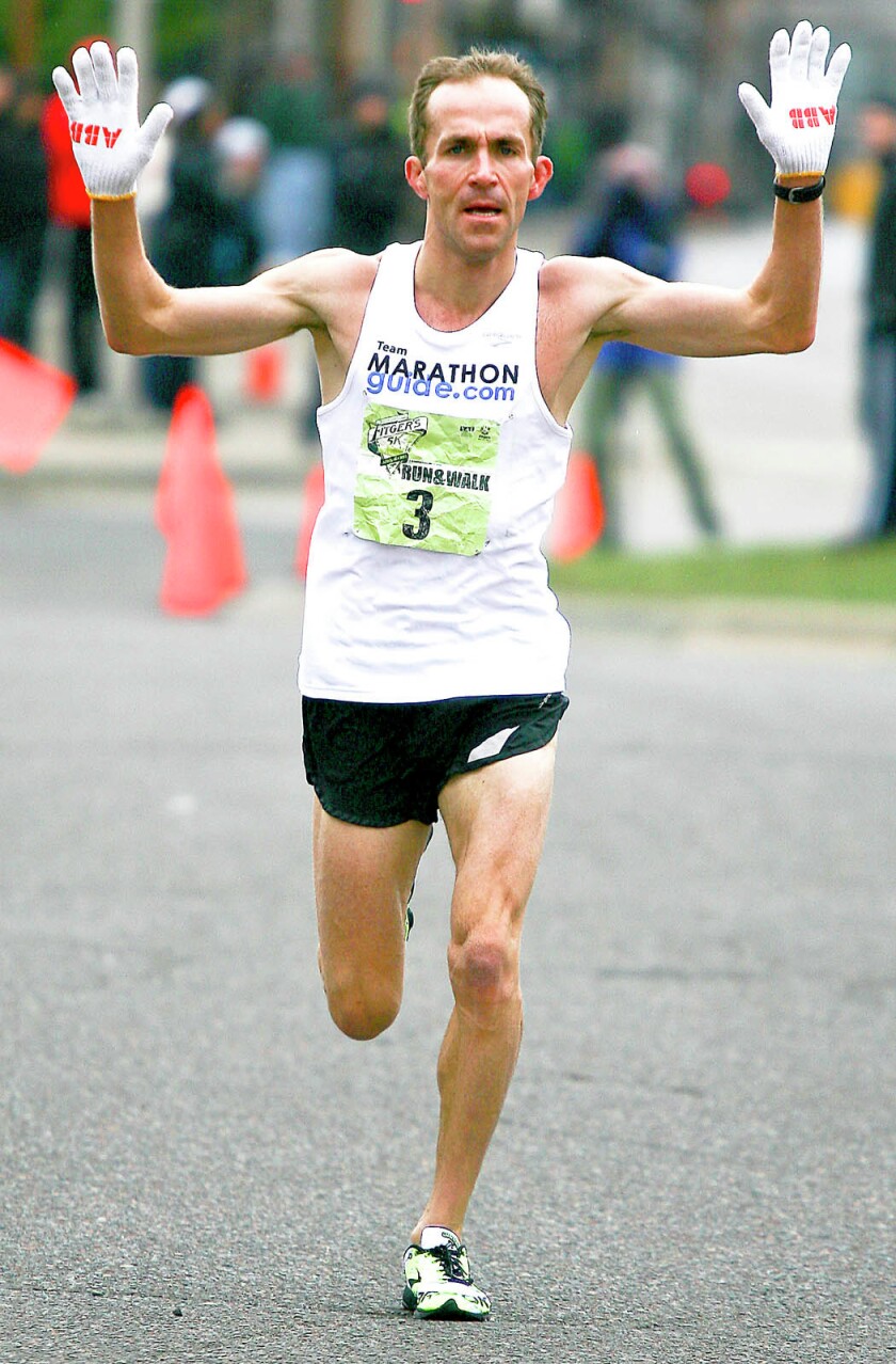 Off and running: Reneau just misses Fitger's 5K course record (with ...