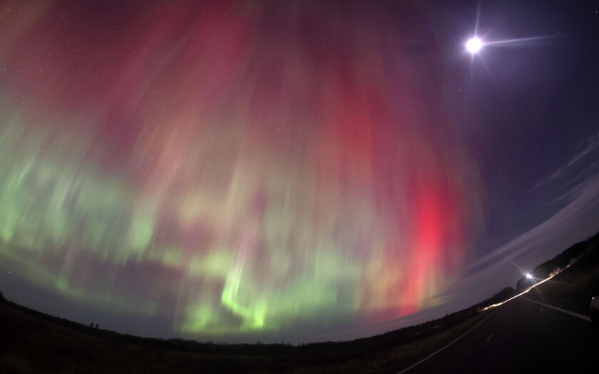 Red aurora and moon