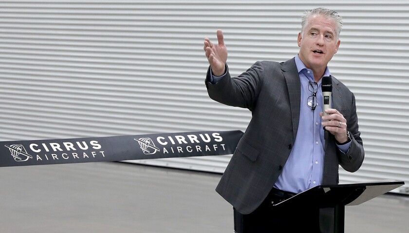 Patrick Waddick, President of Innovation and Operations at Cirrus Aircraft, addresses the crowd