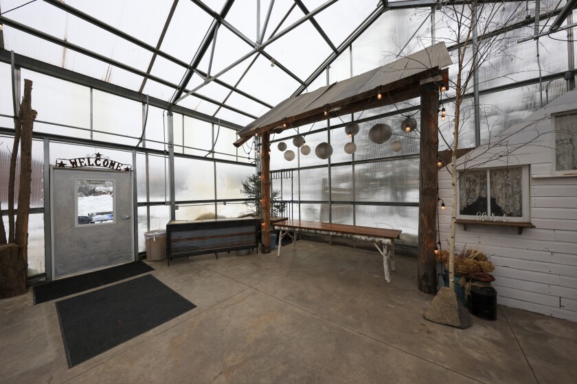 greenhouse and farmhouse converted to event center